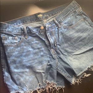 Dark-wash denim shorts.